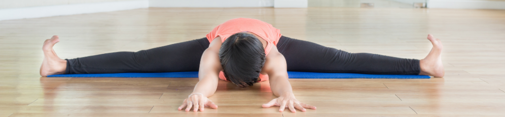 Wide-angle seated straddle asana